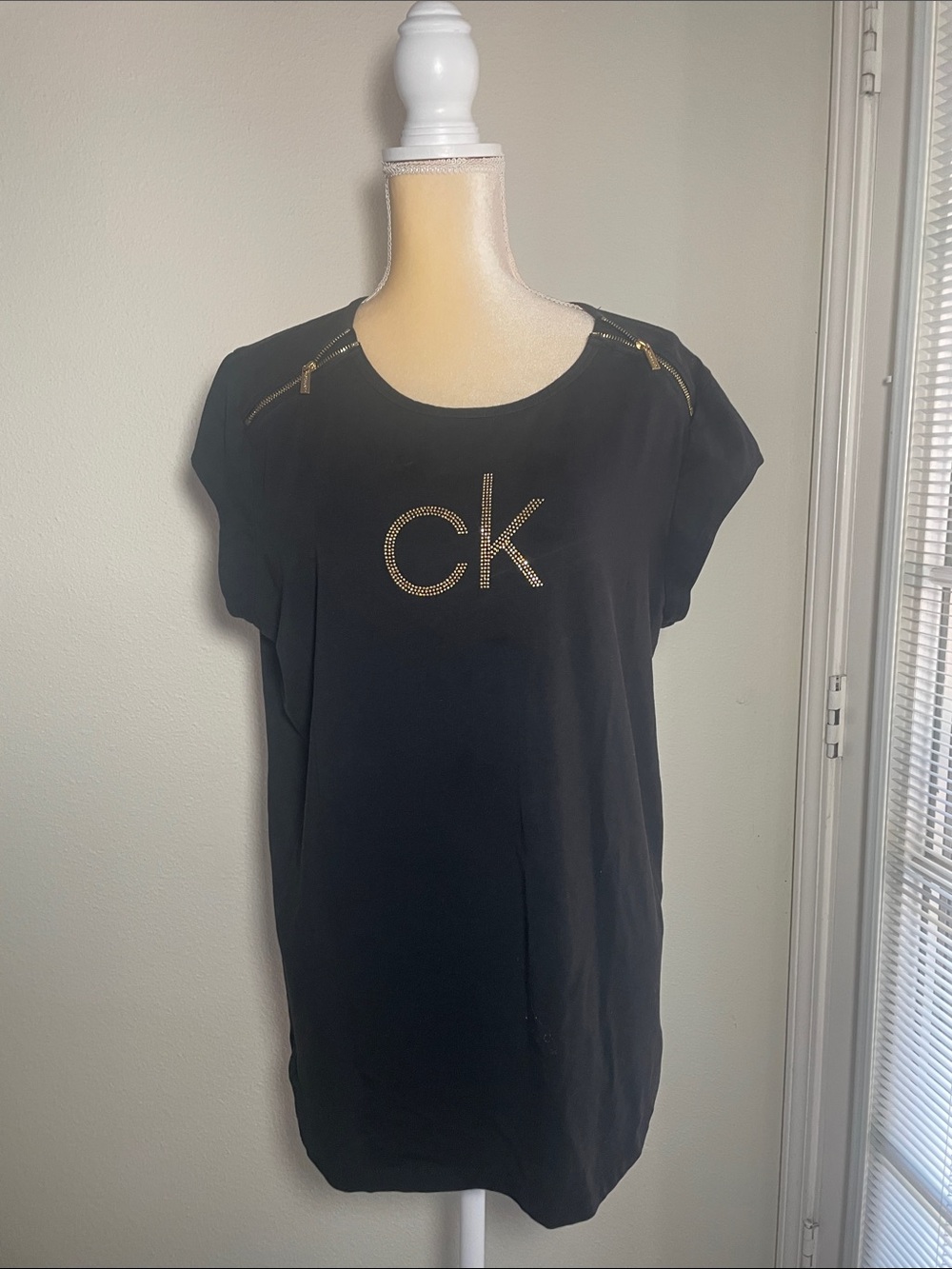 Calvin Klein Black Short Sleeve Top with Gold Logo and Zipper Accents
